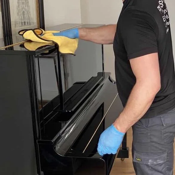 Caring for the surface and action of an upright piano